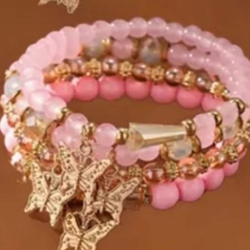 Elegant Pink Beaded Bracelet with Gold Butterfly Charms